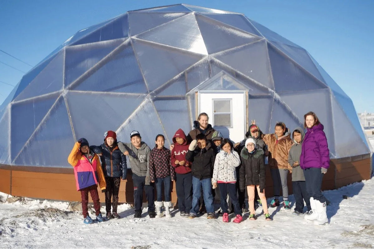 Students in front of a Growing Dome in a northern community