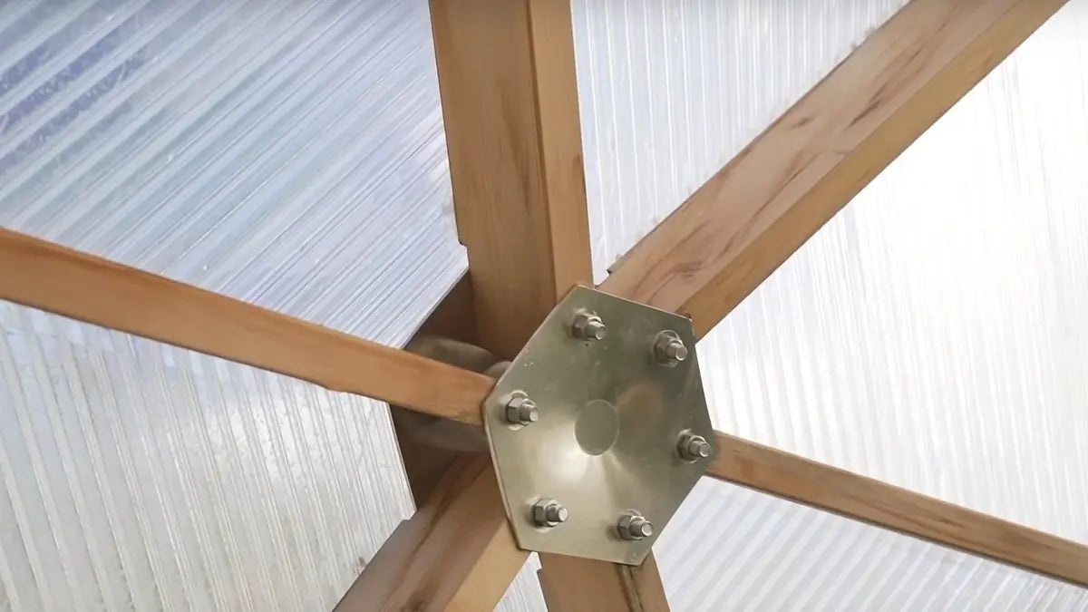 Cedar struts meeting at a steel hub