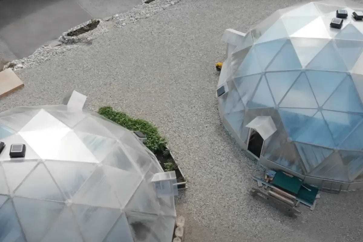 Aerial view of Growing Domes with snowshed entryways