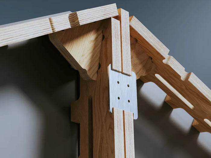 CNC-cut plywood frame joined with a steel connector plate