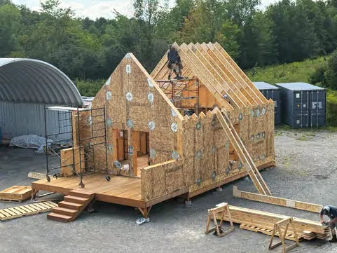 A LockFrame building under construction on site